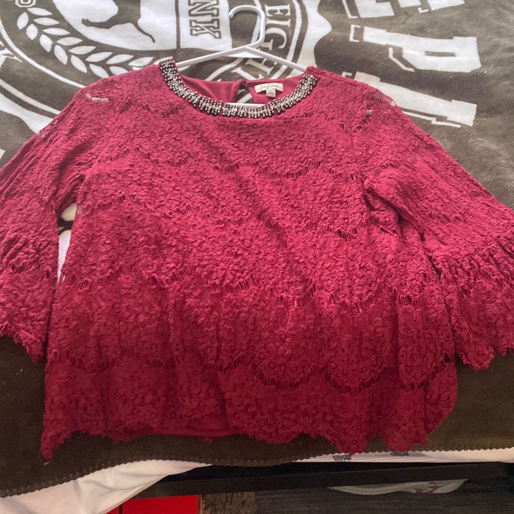 Lace blouse with beaded neckline